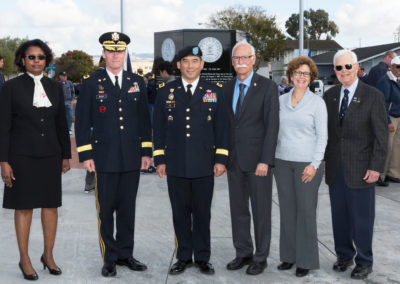 Group photo of Brigadier General Shane Buzza, Major General Garrett Yee, Richard Valle, and Mayor Carol Dutra-Vernaci on November 11, 2017